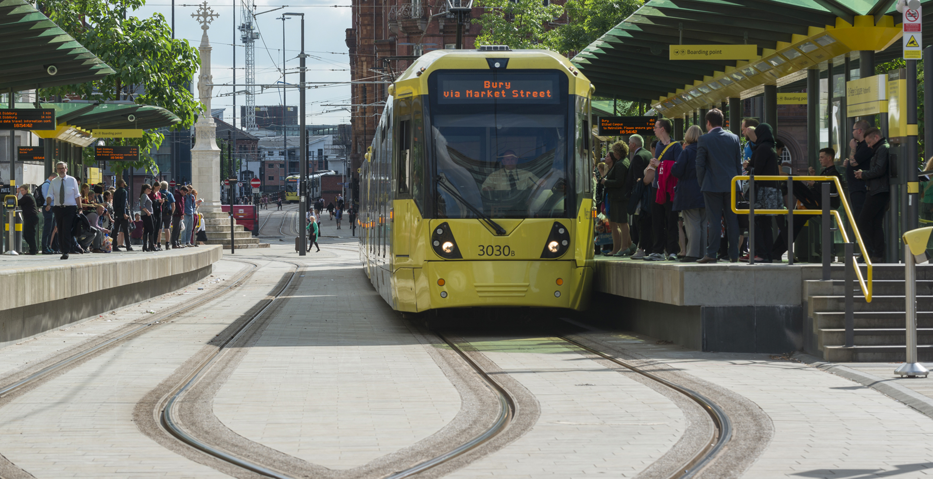 Manchester Metrolink tram at station